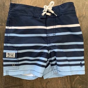 NWT - Ralph Lauren blue swim trunks, 18 mo